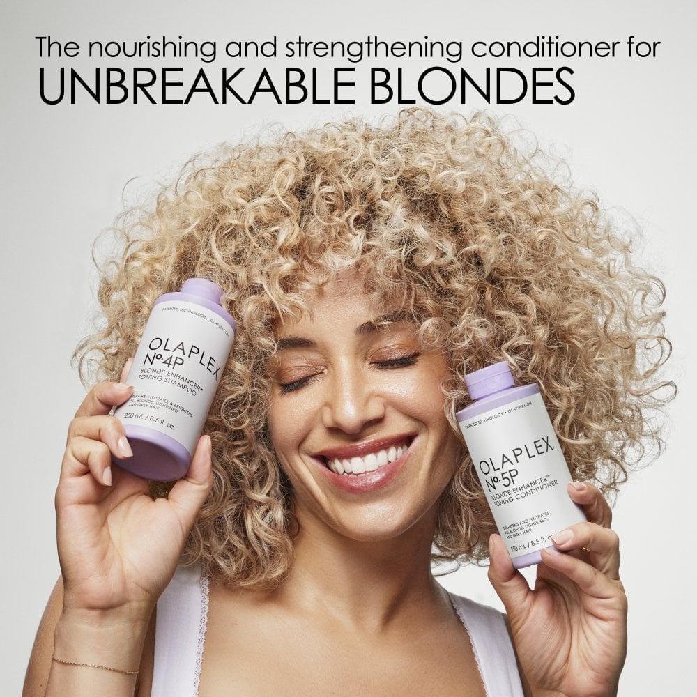 olaplex-no-5p-blonde-enhancer-toning-conditioner-for-repairing-brightening-blonde-grey-hair-250ml-p34414-100305_image.jpg Olaplex No 5P Blonde Enhancer Toning Conditioner 250ml - Image 1